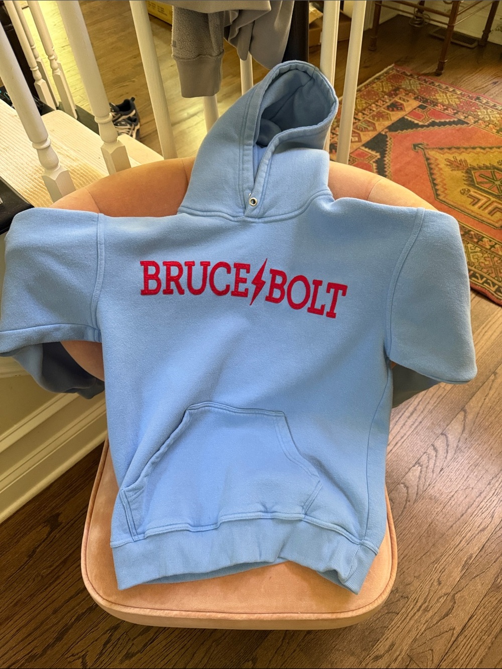 Bruce Bolt Light Blue Kids Hoodie with Red Logo